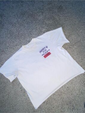 IMAN White Short Sleeve Graphic Tee with Red & Blue Logo